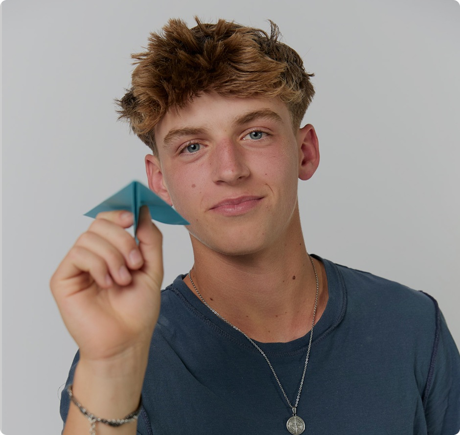 Boy with a paper plane