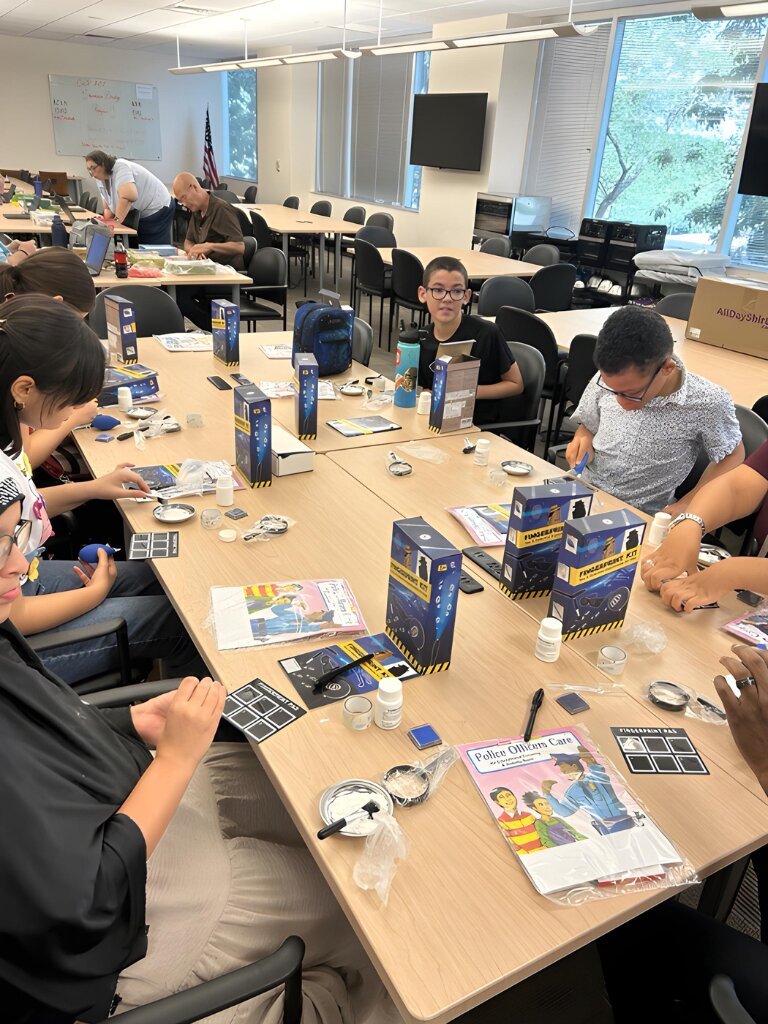 Local students performing fingerprint analysis at Arizona Virtual Academy in Glendale. Students were from Surprise, Glendale, Peoria, West Phoenix and several nearby Native American reservations.