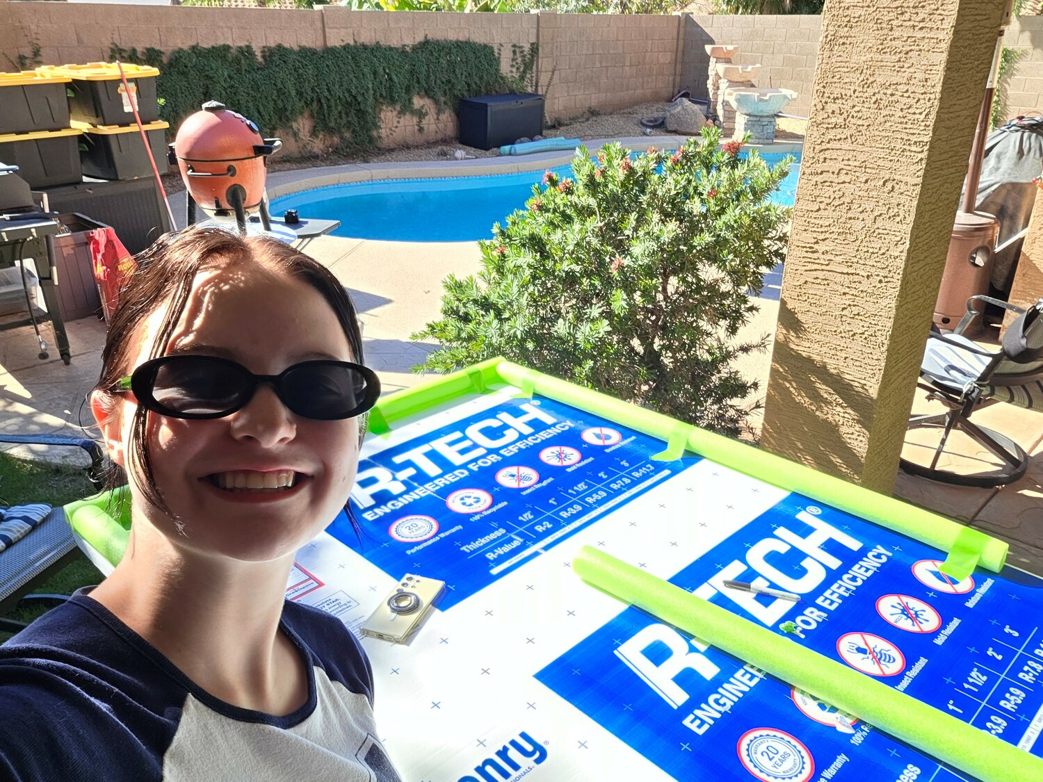 A student on the Insight Academy of Arizona and Arizona Virtual Academy FBLA team smiles while working on a team project.