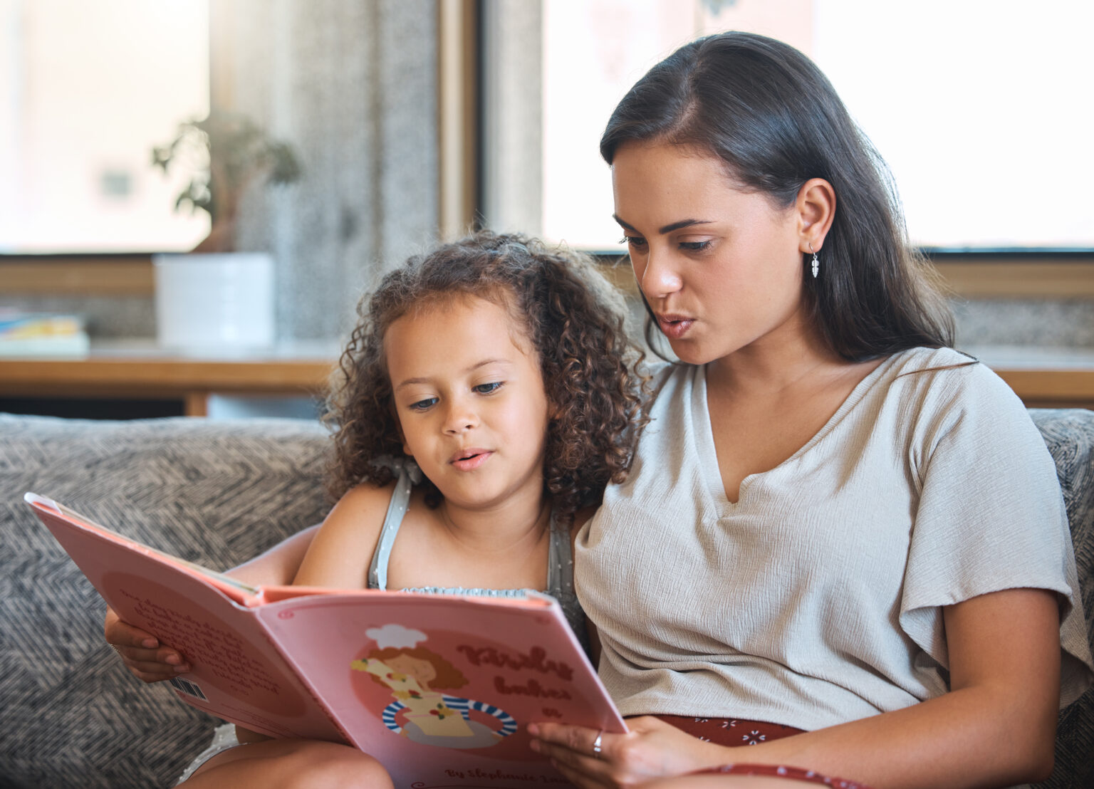 Mom and dughter reading