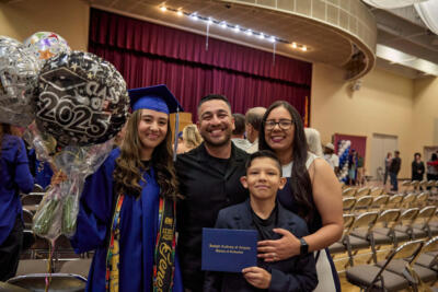 Family smiling at the graduation