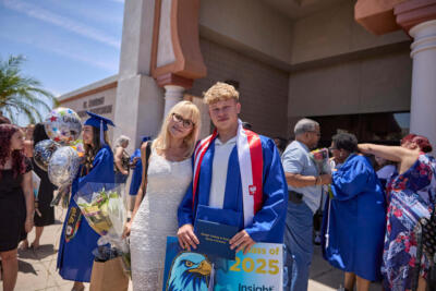 Boy and his mom smiling