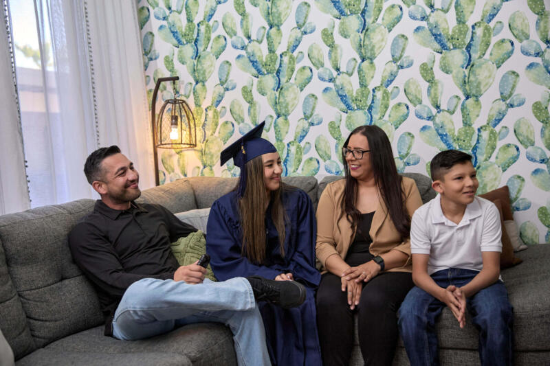 Family talking before graduation