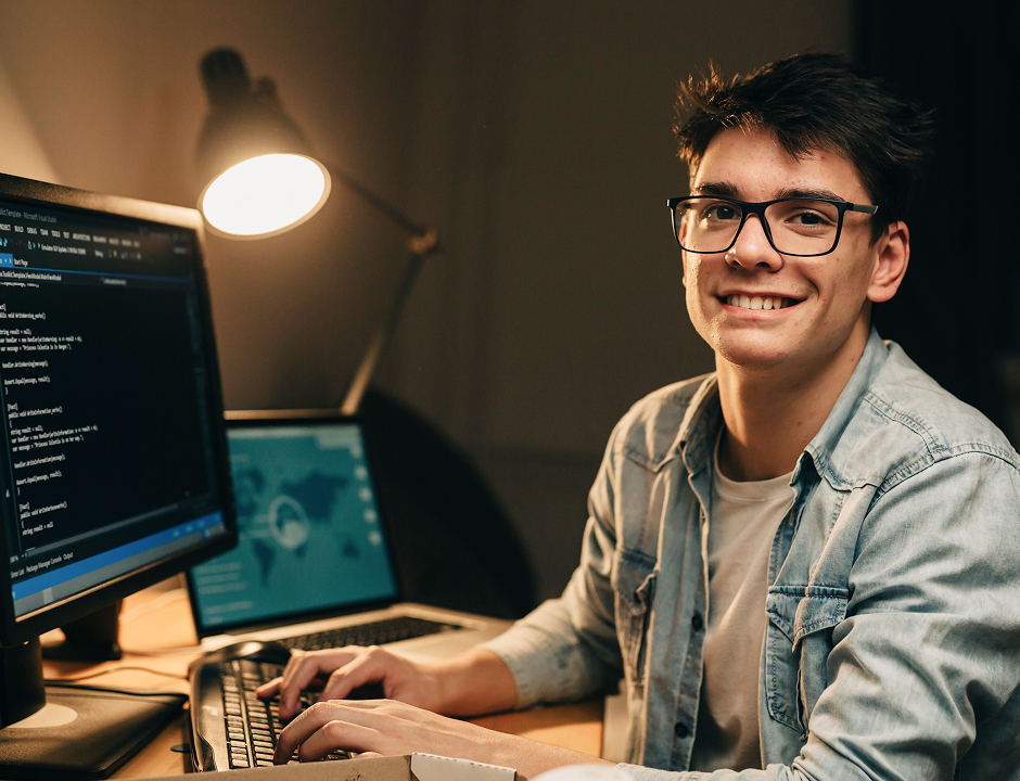 IT Student working with his computer